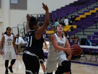 Monica Lopez had 12 points for the Tigers against Hanford West Tuesday night in the Lemoore Event Center.